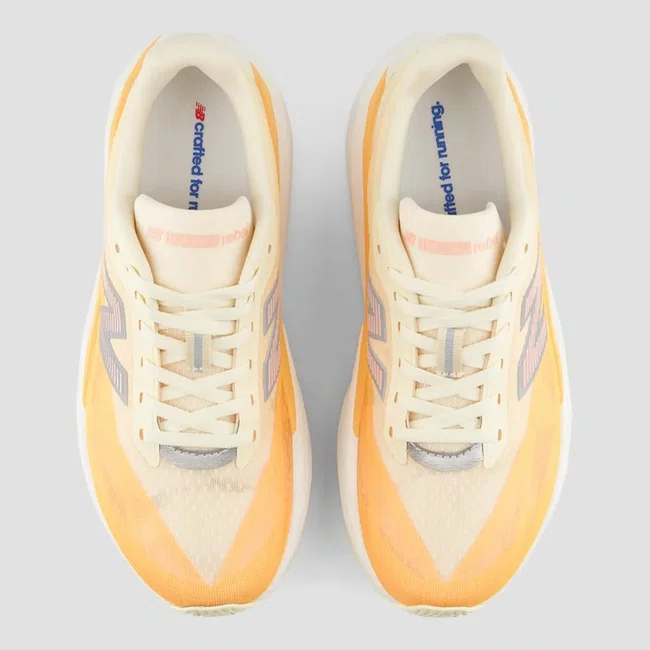 Tênis New Balance FuelCell Rebel v5 Feminino Laranja